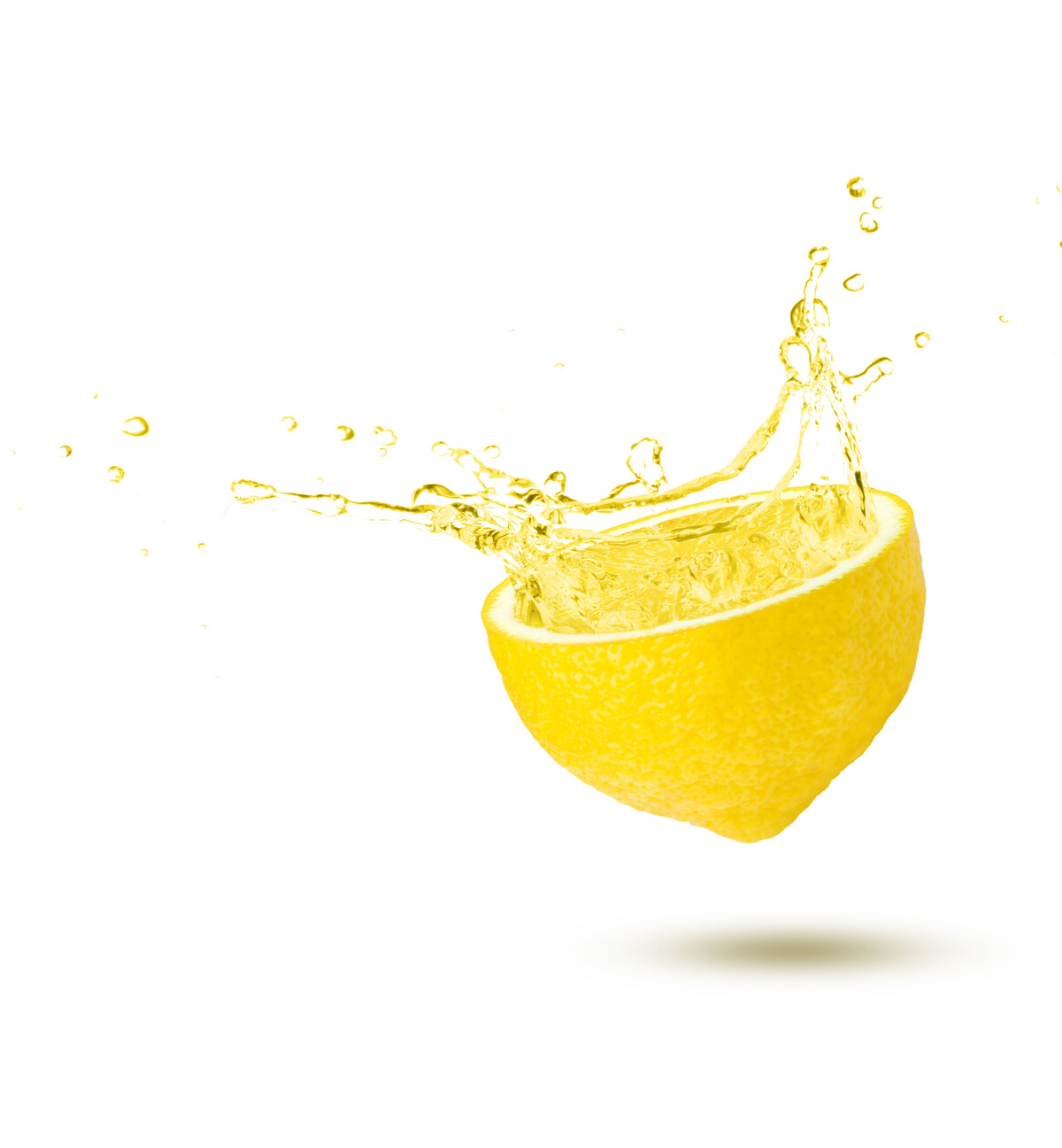 A half lemon surrounded by a splash of liquid.